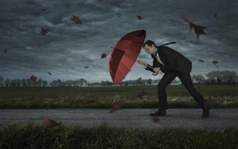 Windy Weather Umbrella Stock Photos, Pictures & Royalty-Free Images - iStock