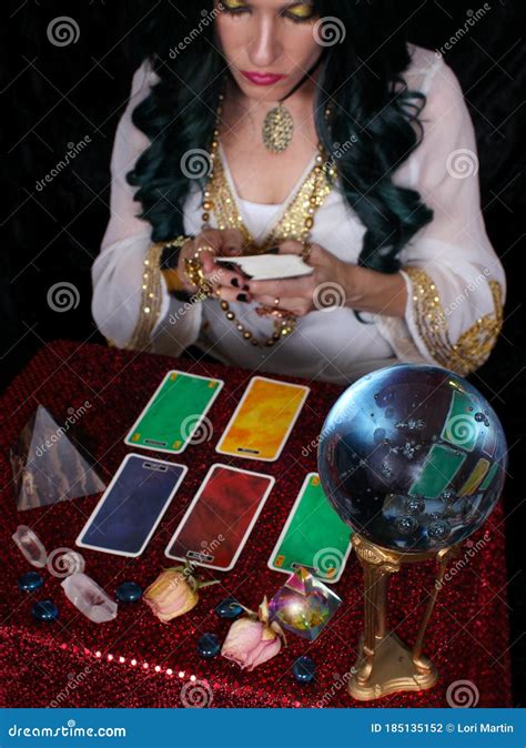 Psychic Card Reader with Crystal Ball and Tarot Cards Stock Photo ...