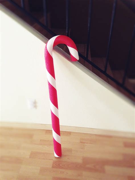 Giant candy canes I made out of red pool noodles, white duck tape and ...