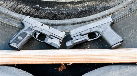 Glock 19 vs FN 509 in a Defensive Battle :: Guns.com