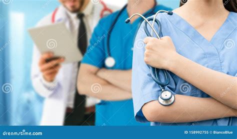 Doctor Working in Hospital with Other Doctors Stock Image - Image of mature, hospitalize: 158992755