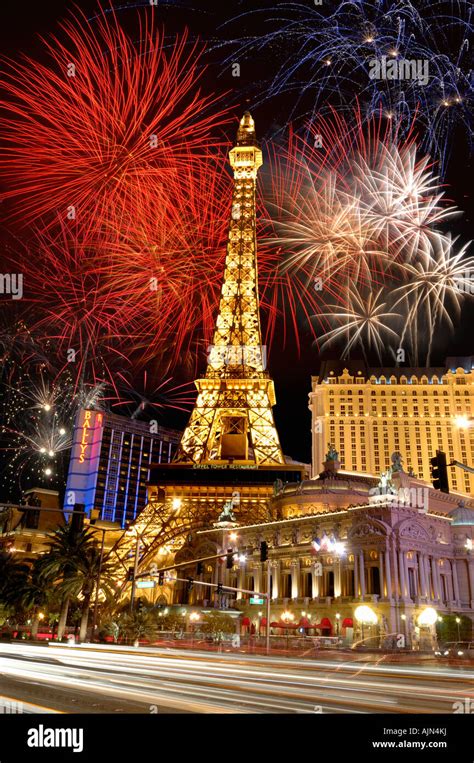 paris hotel and eiffel tower at night las vegas strip nevada usa with firework display behind ...