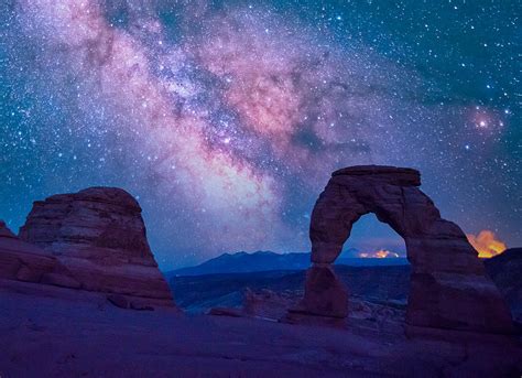 Milky Way at Delicate Arch Photograph by Nathan McDaniel