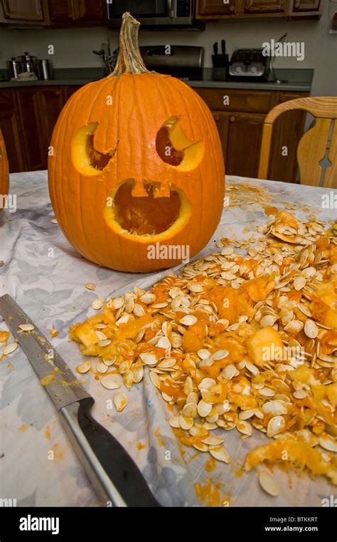 Carving Halloween Pumpkin With Seeds Stock Photo - Alamy