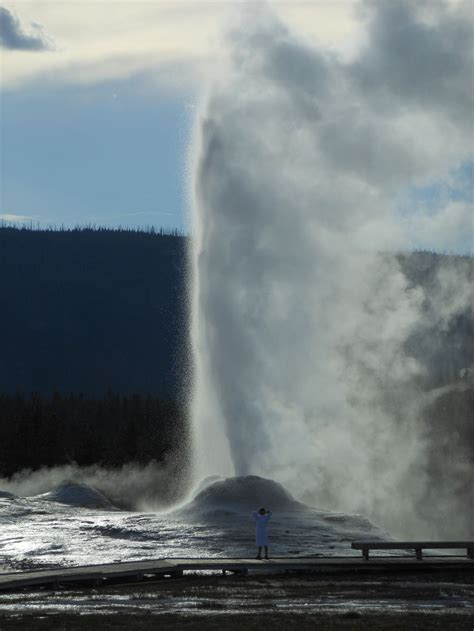 Tourist in front of an Erupting Geyser | Smithsonian Photo Contest | Smithsonian Magazine