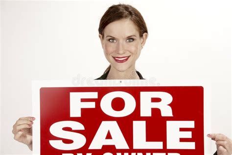 Attractive Female Realtor Holds Up the for Sale Sign Stock Image - Image of broker, caucasian ...