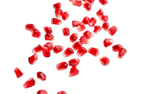 Premium Photo | Pomegranate seeds isolated on white