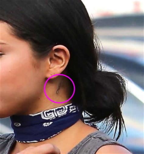 Selena Gomez Shows Off New Behind-the-Ear Neck "g" Tattoo in L.A.- PopStarTats