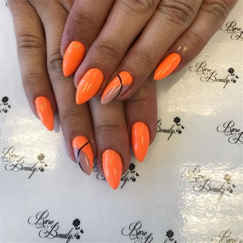 Chiêm ngưỡng mẫu orange nail designs 2023 được yêu thích nhất