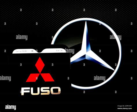 In this photo illustration, the Mitsubishi Fuso Truck and Bus Corporation logo is seen displayed ...