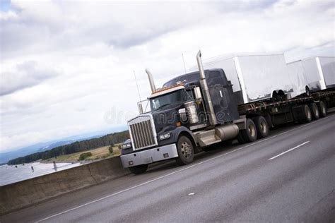 Black American Big Rig Semi Truck on Interstate Highway Stock Image ...