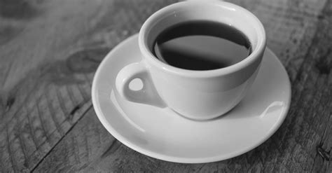 White Ceramic Cup Filled With Black Liquid · Free Stock Photo