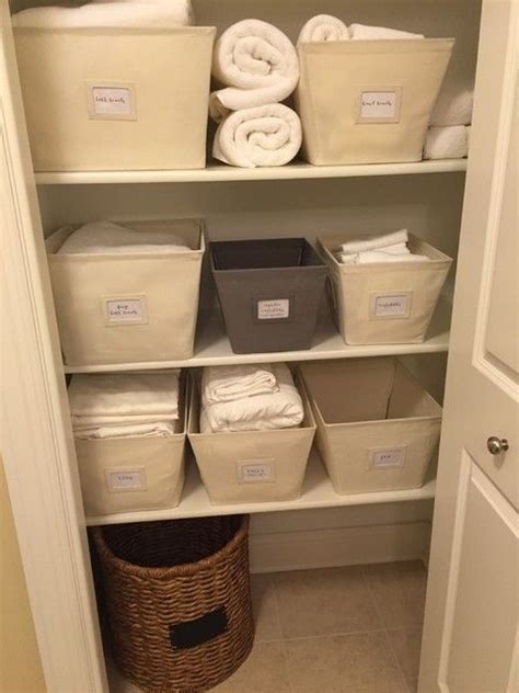 container store bins | Linen closet organization small, Linen closet organization, Hall closet ...