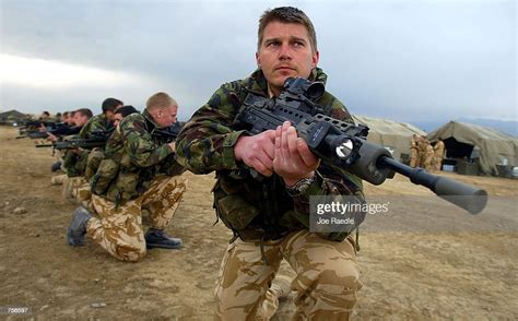 British Royal Marine Corp. Steve Challener practices landing zone ...