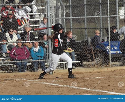 Girls Softball Action At First Base Editorial Photo | CartoonDealer.com #19199023