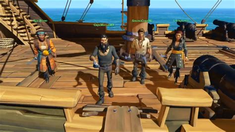 some people are standing on the deck of a ship