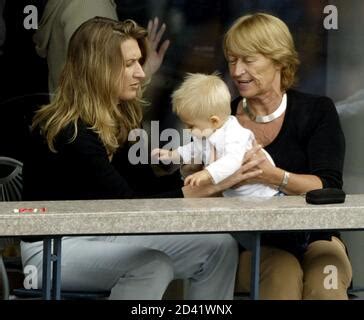 Steffi Graf and her son Jaden Gil watch the match between Andre Agassi ...