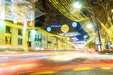 Premium Photo | Light trails on city street at night