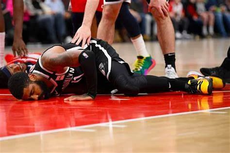 Watch: Kyrie Irving Injures His Right Ankle After Landing on Giannis Antetokounmpo’s Foot in ...