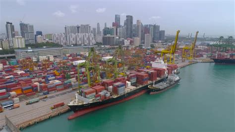 Port Of Singapore. Container Port Docks Ship Container Global Time Lapse Export Commercial ...