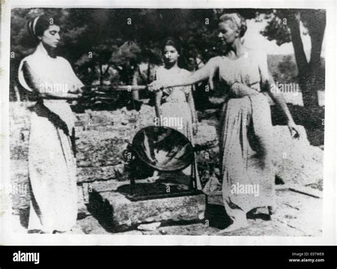 Olympic flame lighted in hi-res stock photography and images - Alamy