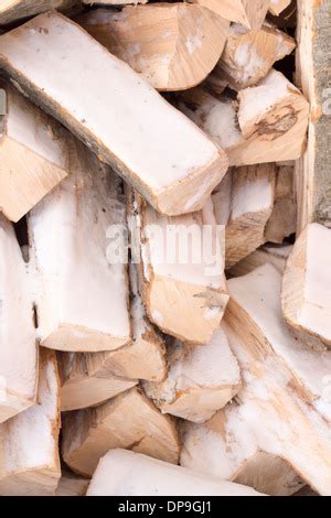 Stack Of Firewood Covered In Snow Stock Photo Alamy