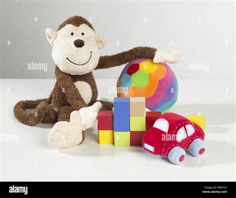 Toy Monkey Car Ball And Building Blocks Stock Photo Alamy