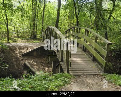 Wooden Foot Bridge Leads Of The Creek Of Larourell Falls Stock Photo