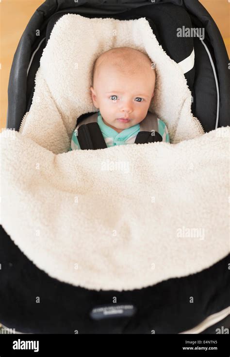 Portrait Of Baby Boy 2 5 Months Sitting In Stroller Stock Photo Alamy