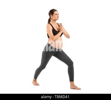 Pregnant Woman Practicing Yoga On Her Bed Stock Photo Alamy