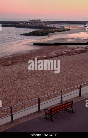 Sunset Over The Cobb In Lyme Regis Dorset England Uk Stock Photo Alamy