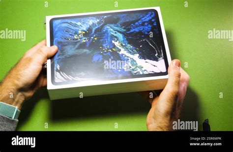 Man Unboxing Unpacking New Apple Computers Ipad Pro Stock Video Footage