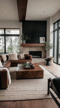 A Living Room Filled With Lots Of Furniture Next To A Fire Place And