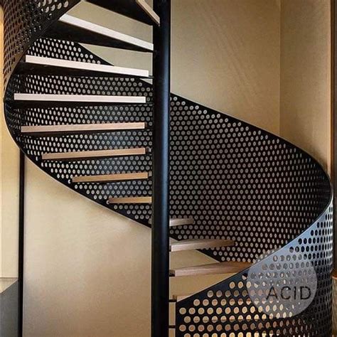 Modern Spiral Staircase With Perforated Metal Railing