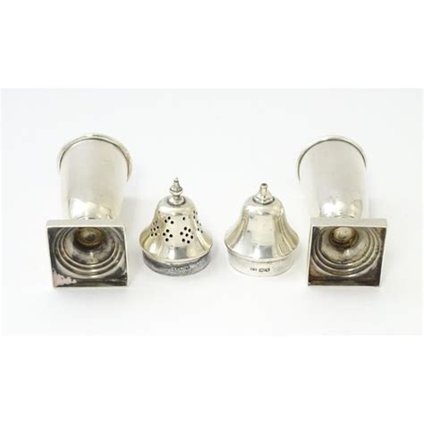 A Silver Cruet Set Comprising Salt And Pepper Hallmarked Sheffield