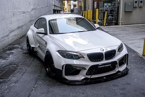 White Bmw M Parked By Graffiti Wall