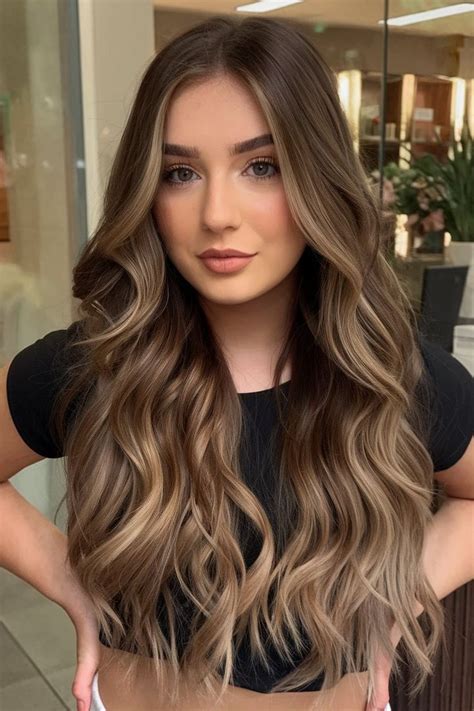 Long Wavy Balayage With Blonde Accents For A Trendy Look Hair Color