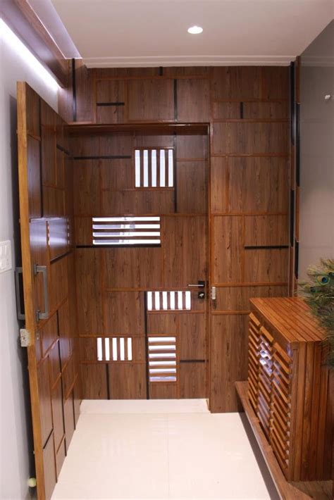 Entrance Foyer With Wooden Designer Entrance Door Shoe Rack