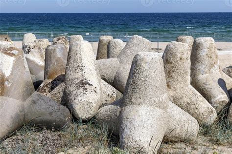 A Breakwater Made Of Concrete Structures Of Tetrapods Installed On The