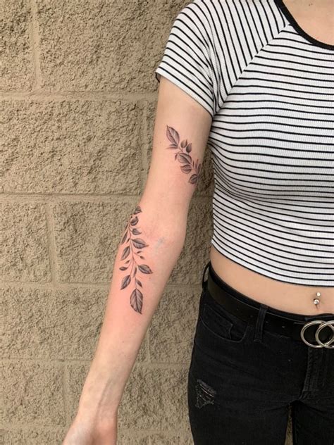 Wrap Around Arm Tattoo