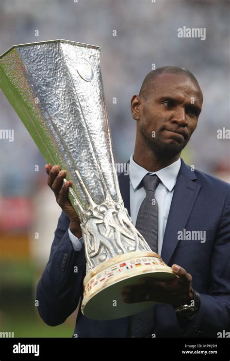 Retired Footballer Eric Abidal Presents The Uefa Europa League Trophy