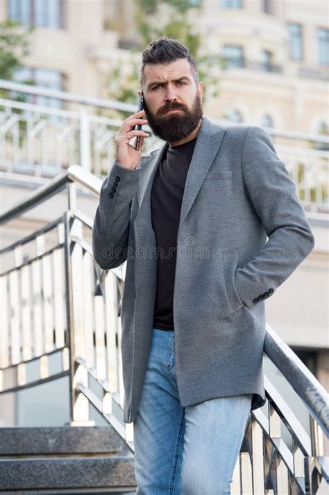 Stay In Touch Man Bearded Serious Businessman Hold Mobile Phone Urban