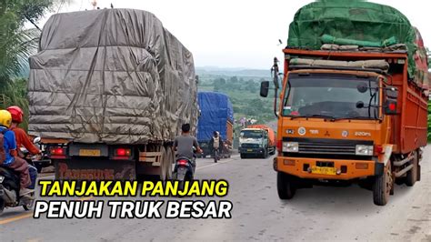 TANJAKAN CAKAT LINTAS SUMATERA MELINTAS TRUK BESAR MUATAN BERAT