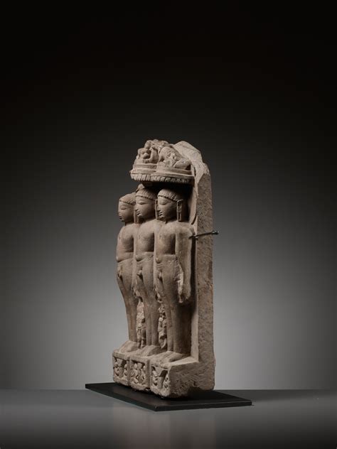 Indian School 11th Century A Jain Sandstone Stele Of Three Jinas