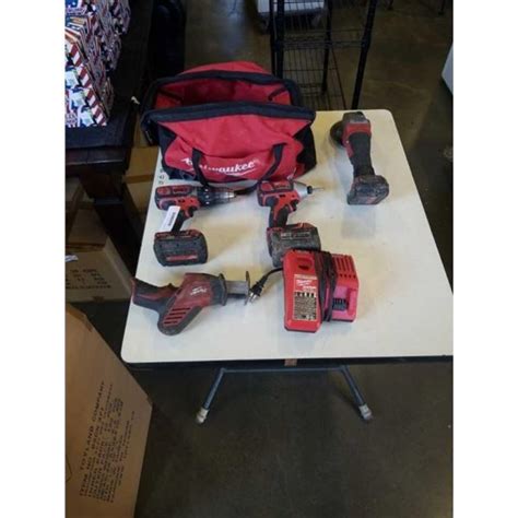 Milwaukee Cordless Tool Set Includes M18 12 Inch Hammer Drill 14 Inch Impact Gun Fuel