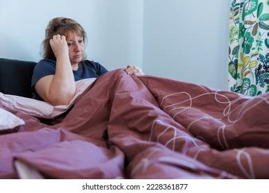 Unhealthy Mature Woman Suffering Flu Cold Stock Photo