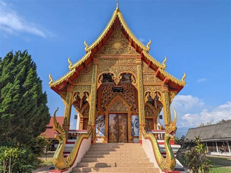 picture  majestic buddhist temple  golden carvings ornate