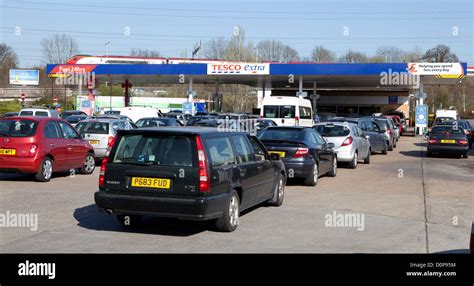 Fuel Crisis In Uk Cars Queue For Fuel At A Tesco Petrol Station And