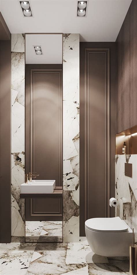 A Bathroom With Marble Walls And Flooring Next To A White Bathtub In