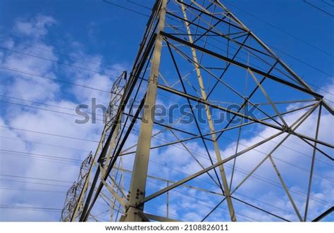 High Tension Electric Towers Blue Skies Stock Photo 2108826011